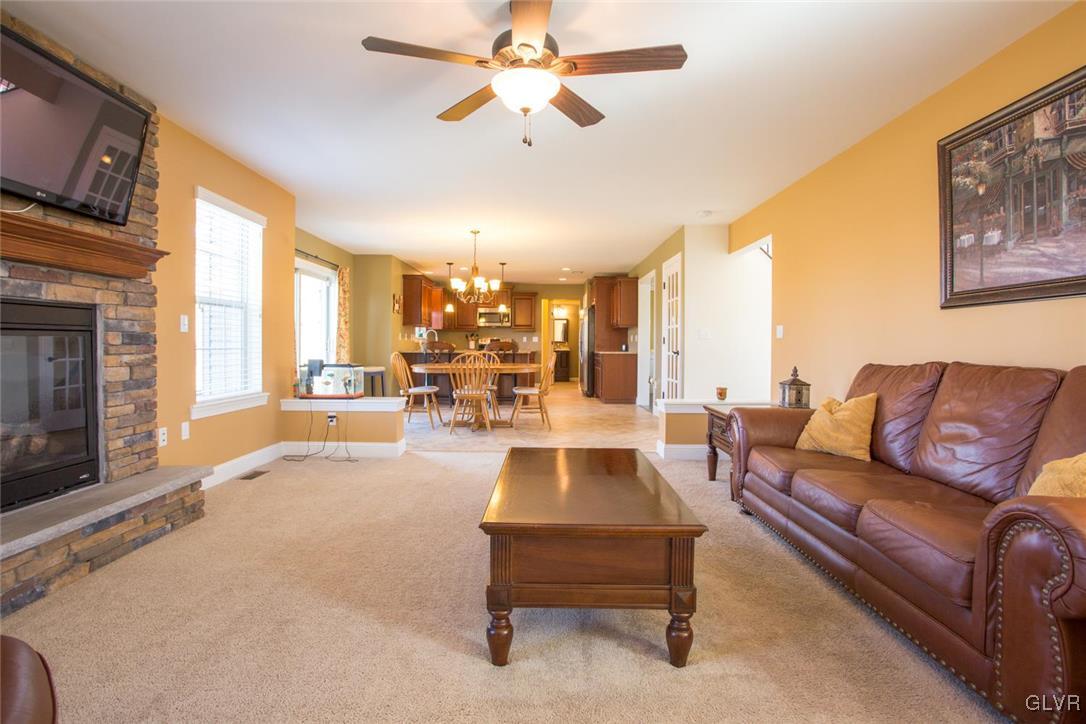 128 Fox Ridge Nazareth, PA 18064 - Photo 14 of 39 a living room with furniture and a fireplace
