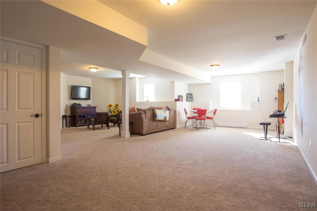 128 Fox Ridge Nazareth, PA 18064 - Photo 33 of 39 a bed room with furniture and a large window
