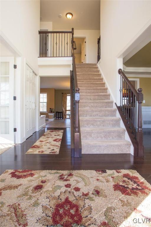 128 Fox Ridge Nazareth, PA 18064 - Photo 4 of 39 a view of a hallway with wooden floor and dining room