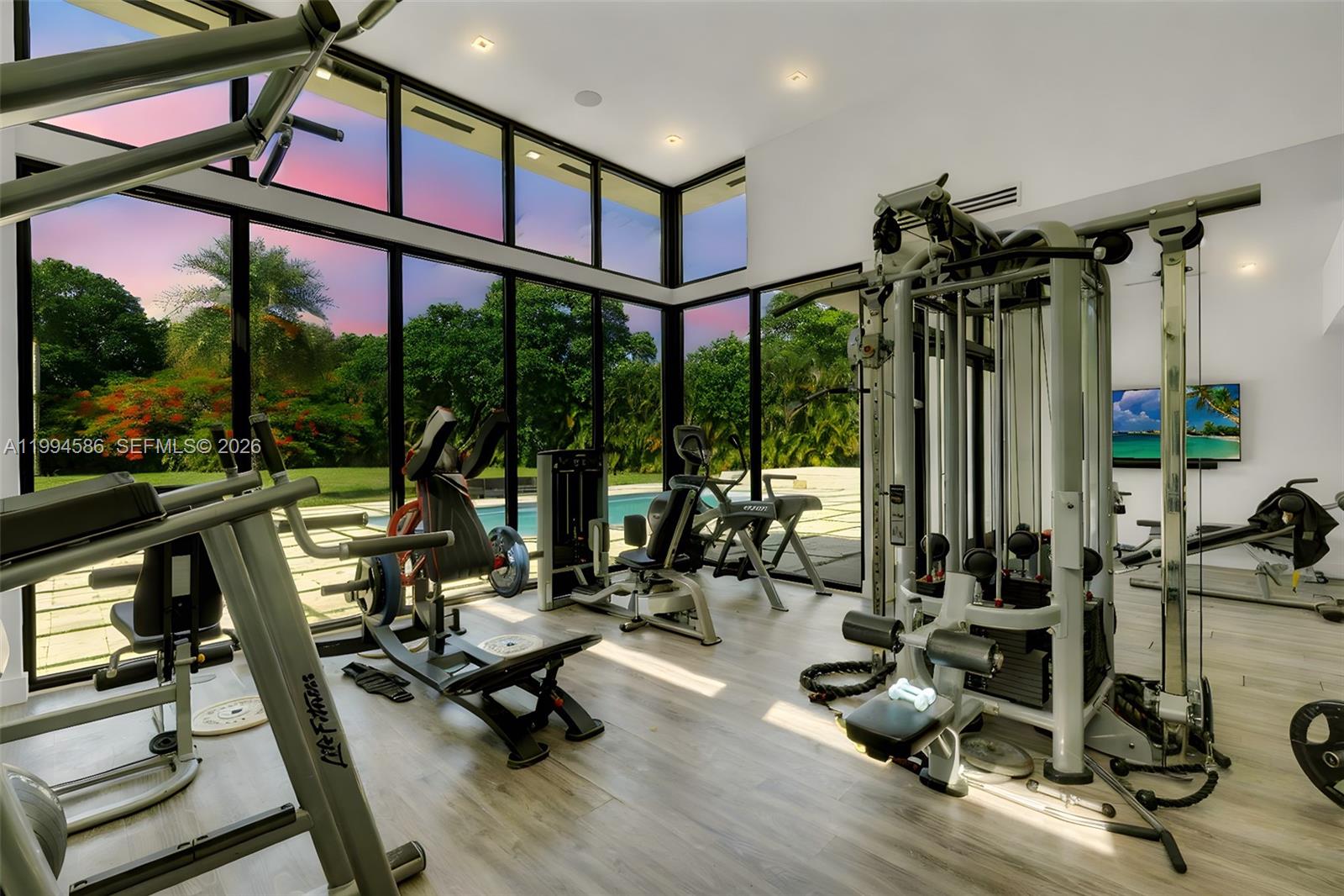 13441 Mustang Trail Southwest Ranches, FL 33330 - Photo 57 of 67 Full size gym with bathroom