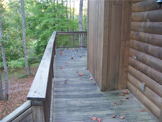 171 Love Lady Hollow Road Tennessee Ridge, TN 37178 - Photo 17 of 20 THE DECK ACTUALLY COVERS 3 FULL SIDES OF THE HOUSE.