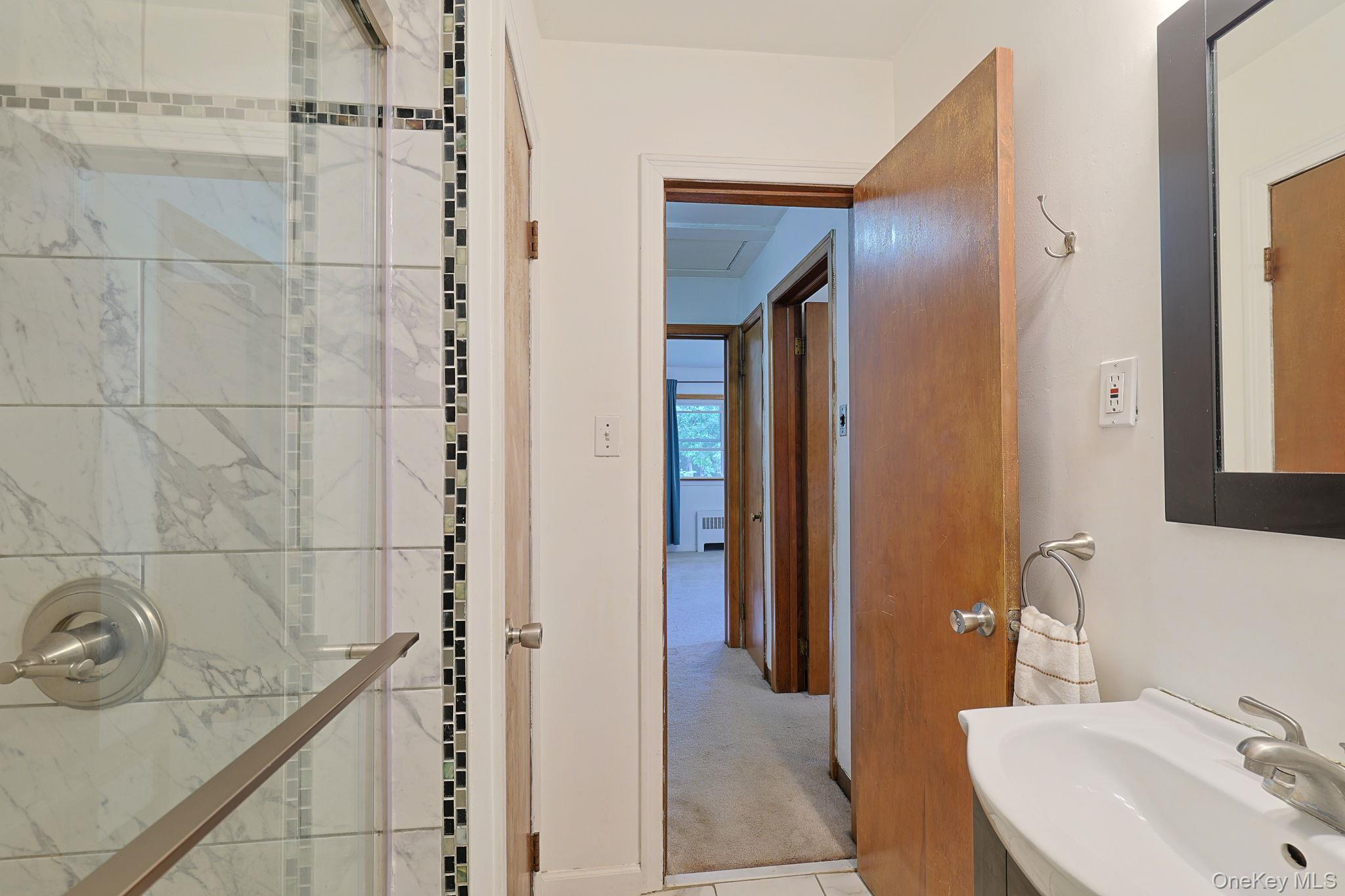 178 Mt Airy Road New Windsor, NY 12553 - Photo 16 of 31 a bathroom with a granite countertop sink and shower
