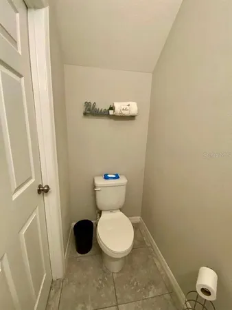 a bathroom with a toilet and a sink