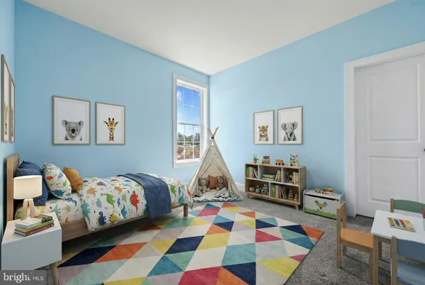 a bed room with a bed and a painting on the wall