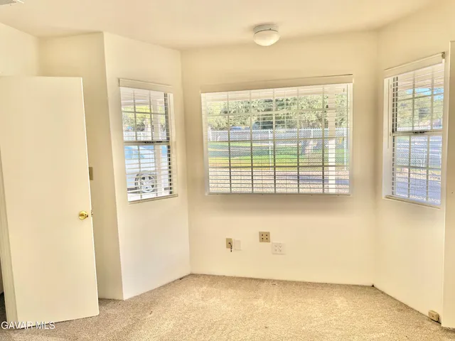 a bathroom with a shower and a toilet