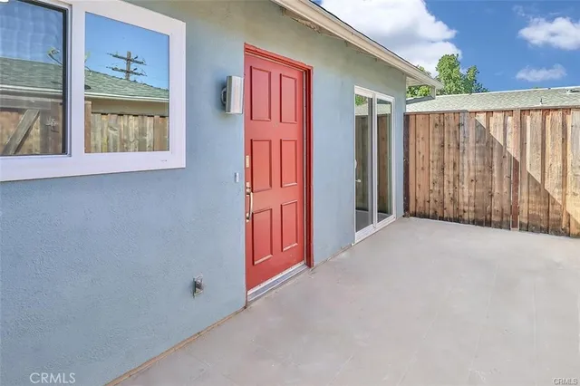 a view of a house with a street