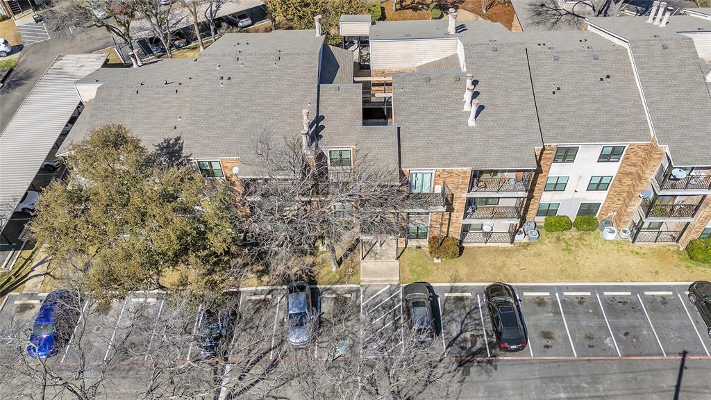 8109 Skillman Street, Unit 2007 Dallas, TX 75231 - Photo 3 of 11 an aerial view of residential houses with outdoor space