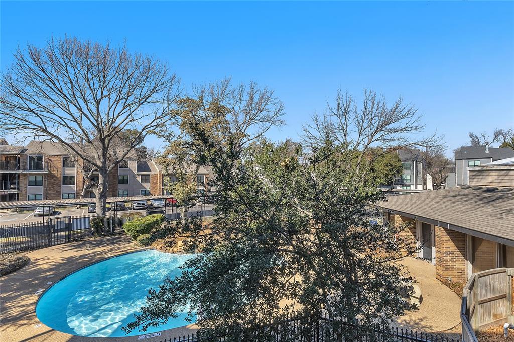 8109 Skillman Street, Unit 2007 Dallas, TX 75231 - Photo 6 of 11 a view of a swimming pool with a patio