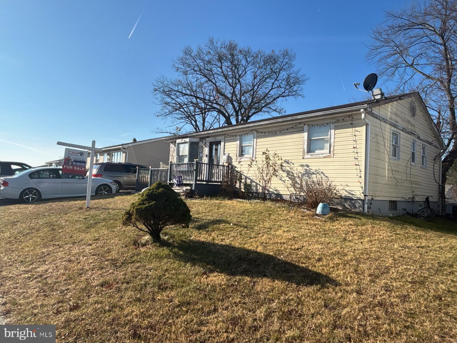 342 Dameron Street South Laurel, MD 20724 - Photo 2 of 2 a backyard of a house with barbeque oven and table