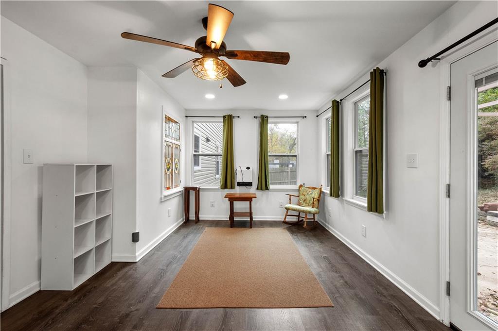 596 Clifton Road Bethel Park, PA 15102 - Photo 16 of 36 a living room with furniture and a large window