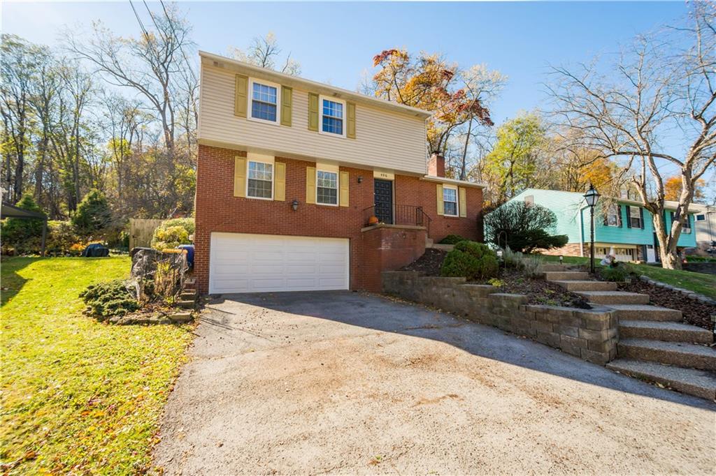596 Clifton Road Bethel Park, PA 15102 - Photo 2 of 36 a view of a house with snow on the wall