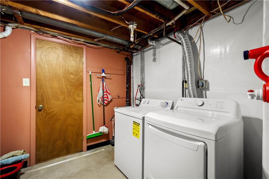 596 Clifton Road Bethel Park, PA 15102 - Photo 27 of 36 a utility room with dryer and washer