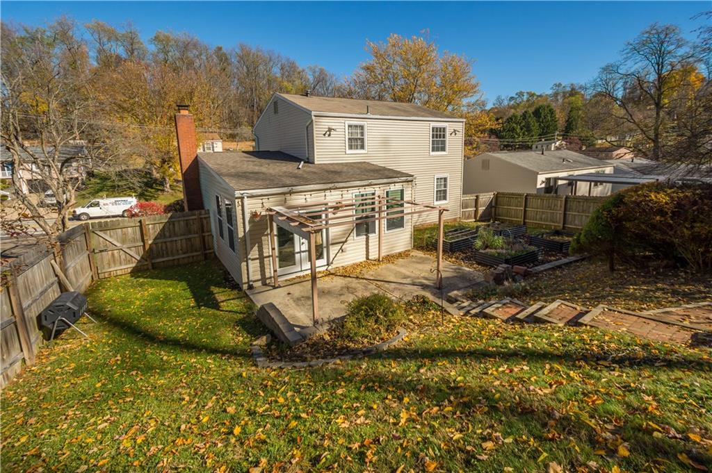 596 Clifton Road Bethel Park, PA 15102 - Photo 32 of 36 a view of a house with a yard