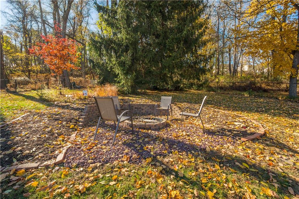 596 Clifton Road Bethel Park, PA 15102 - Photo 36 of 36 a lawn chairs sitting in a backyard of a house