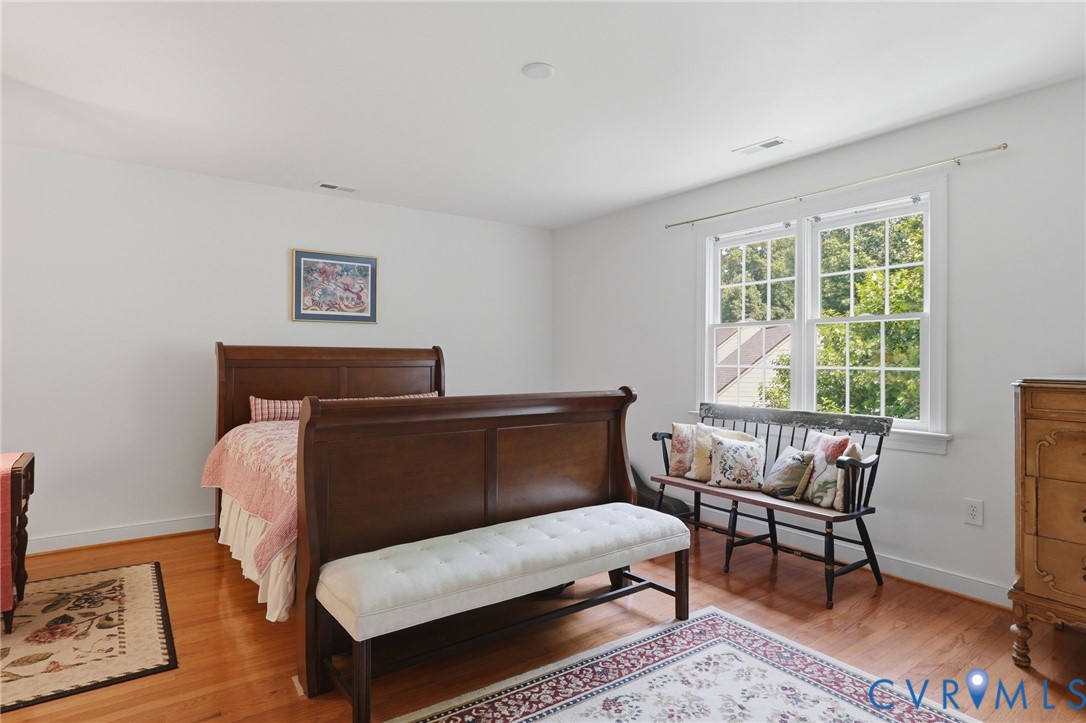 13424 Tipple Point Road Midlothian, VA 23114 - Photo 32 of 53 a bedroom with a bed chair and window