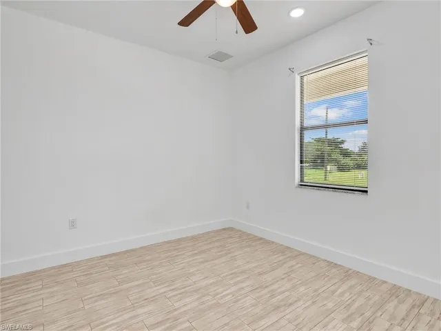 an empty room with window