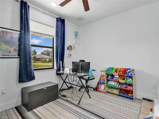 a room with furniture and a window