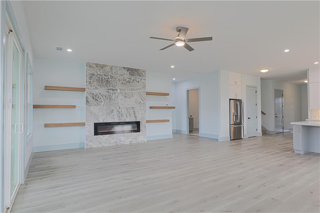 1480 Wheeler Cemetery Road Maysville, GA 30558 - Photo 18 of 50 a view of an empty room with a kitchen