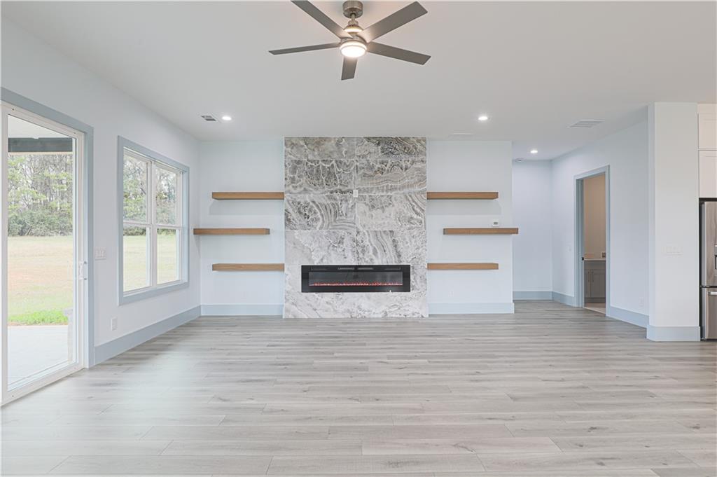 1480 Wheeler Cemetery Road Maysville, GA 30558 - Photo 19 of 50 a view of empty room with wooden floor and window