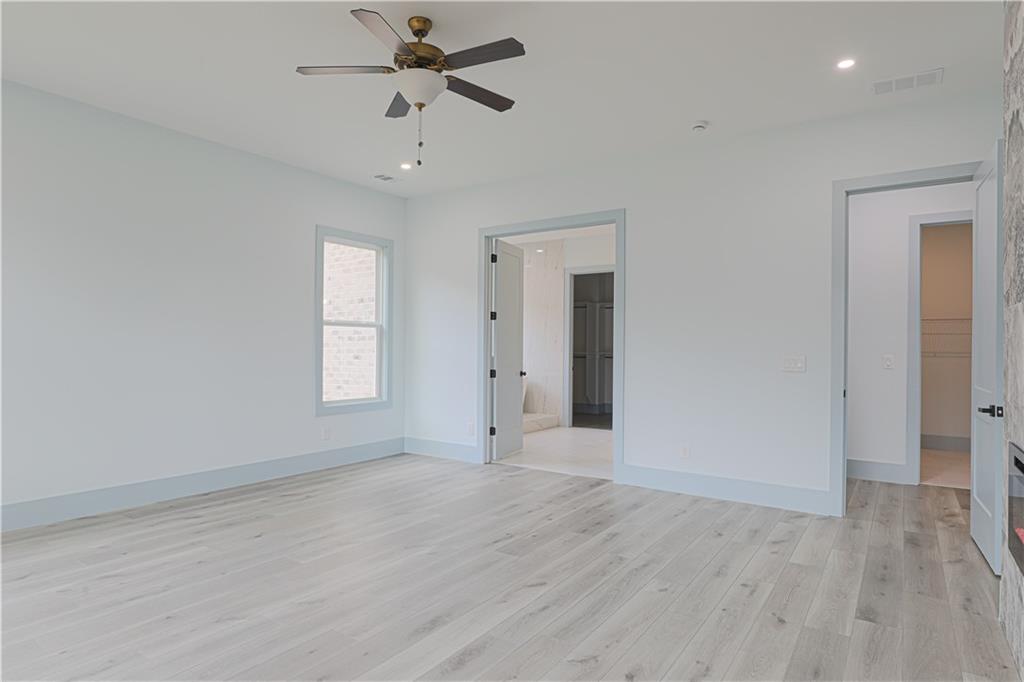 1480 Wheeler Cemetery Road Maysville, GA 30558 - Photo 32 of 50 wooden floor in an empty room with a window