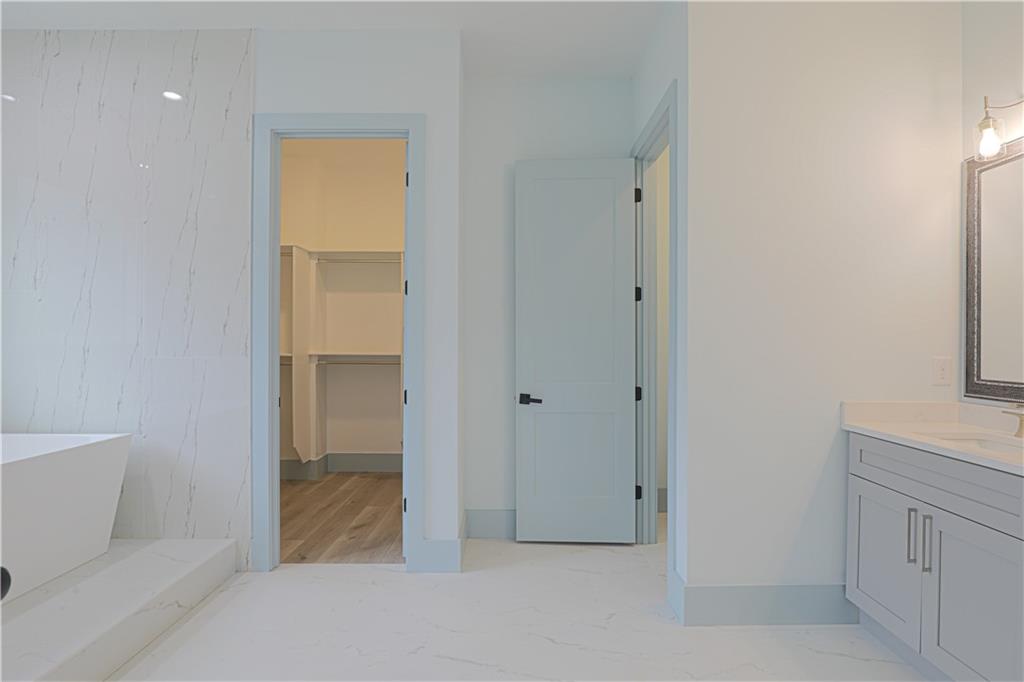 1480 Wheeler Cemetery Road Maysville, GA 30558 - Photo 33 of 50 a view of an empty room with closet and a bathroom
