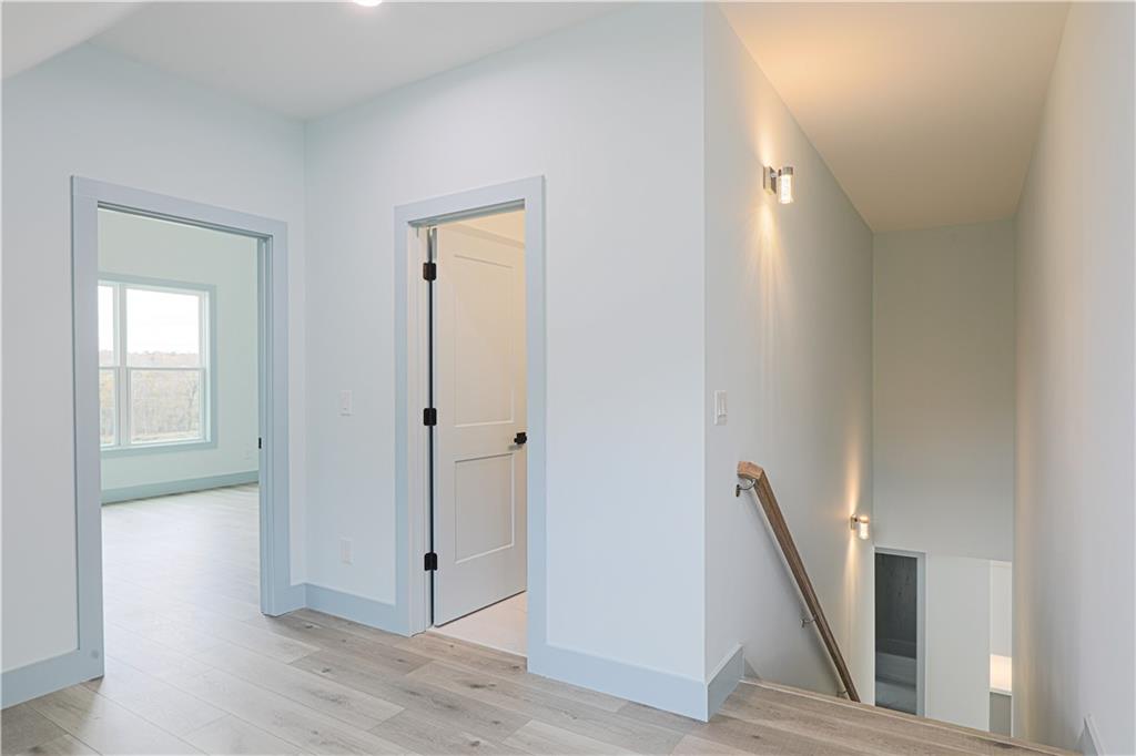 1480 Wheeler Cemetery Road Maysville, GA 30558 - Photo 37 of 50 a view of a hallway with wooden floor