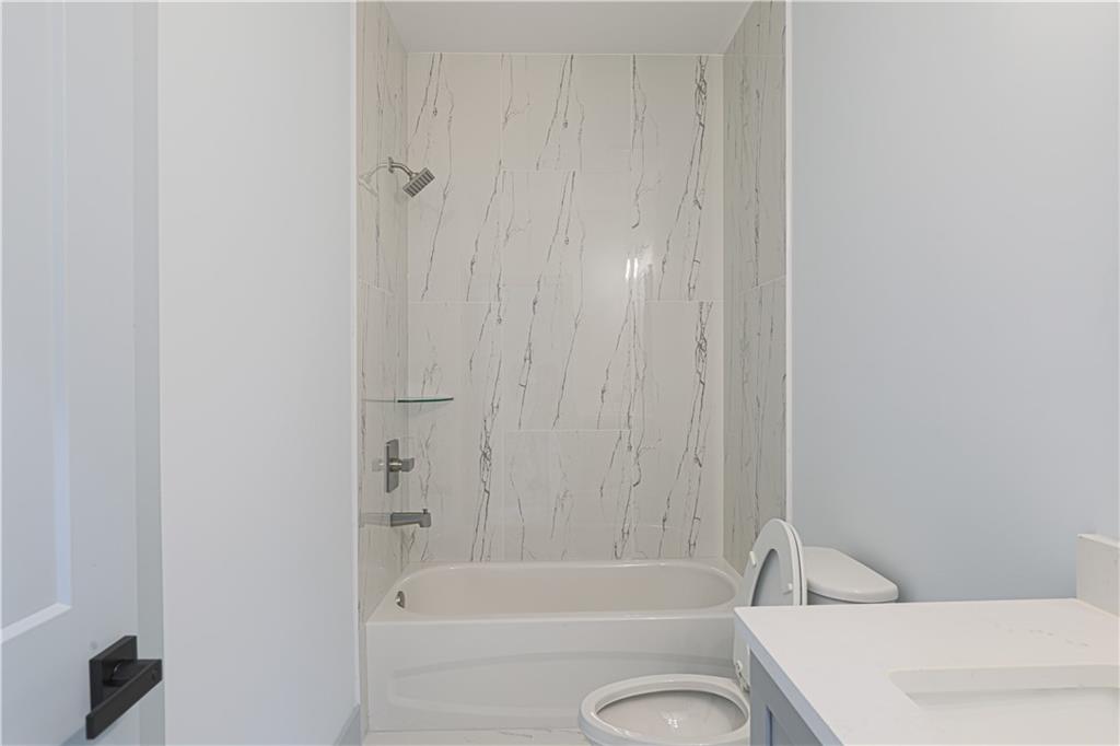 1480 Wheeler Cemetery Road Maysville, GA 30558 - Photo 41 of 50 a bathroom with a toilet and a bath tub