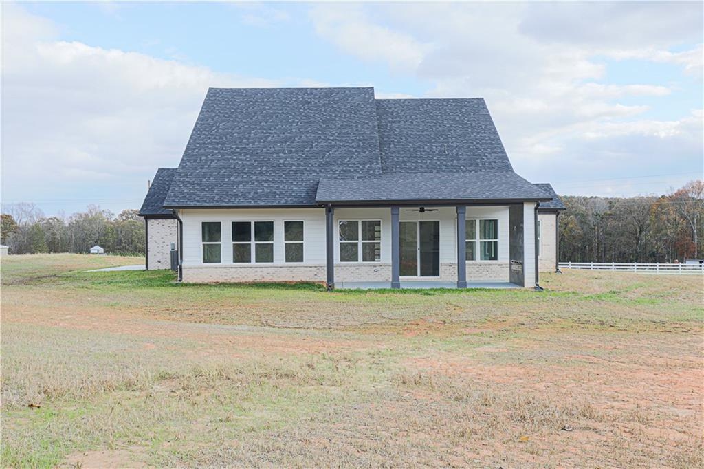 1480 Wheeler Cemetery Road Maysville, GA 30558 - Photo 50 of 50 a front view of a house with a garden