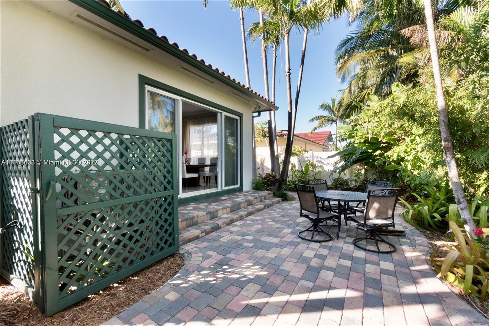 9033 Byron Avenue Surfside, FL 33154 - Photo 3 of 25 a view of outdoor space yard and porch