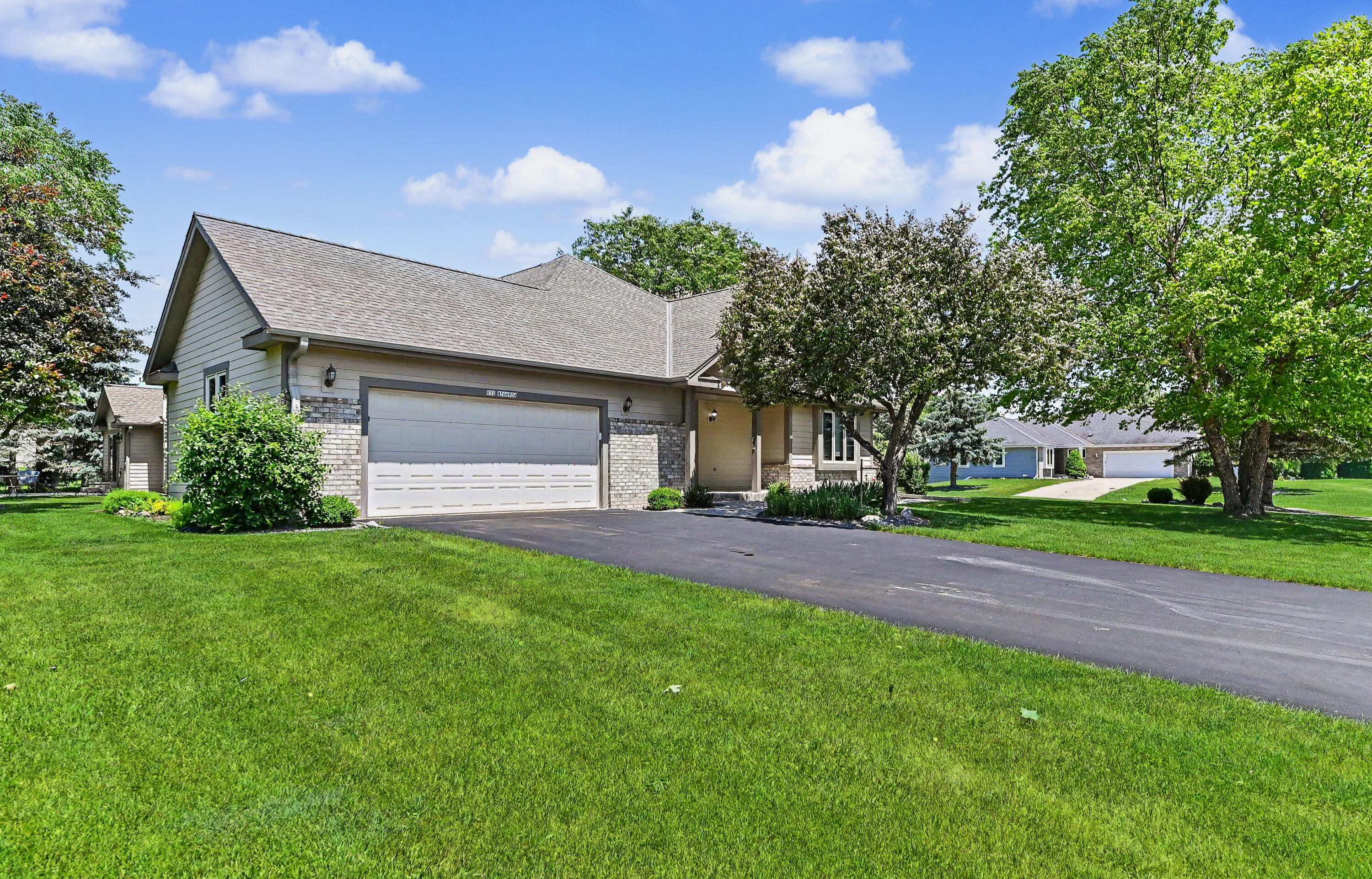 N22-w26492 Shooting Star Road, Unit 2 Pewaukee, WI 53072 - Photo 3 of 32 Attached 2 car garage
