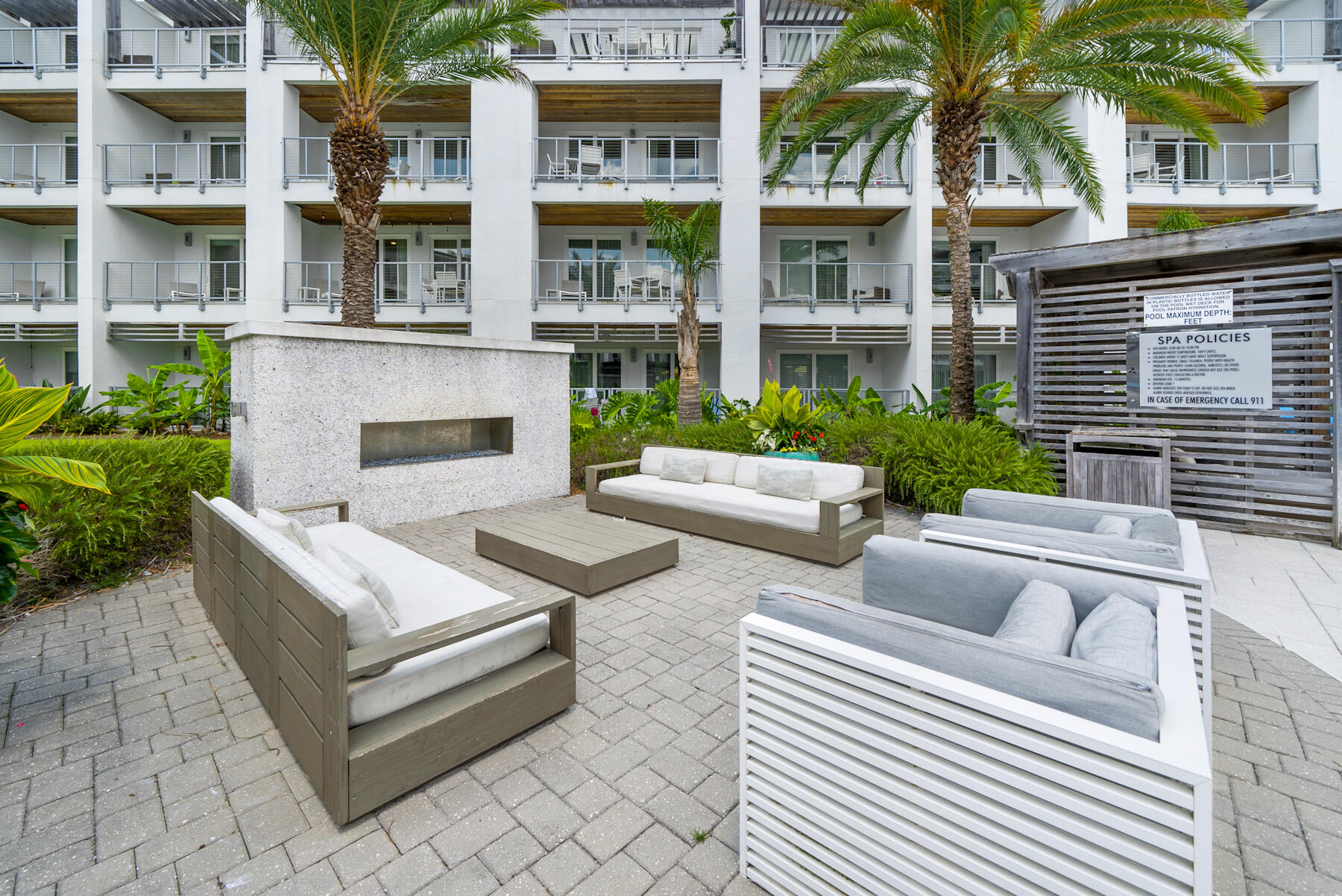 10941 East County Highway 30A, Unit 345 Inlet Beach, FL 32461 - Photo 34 of 45 Courtyard living with fireplace