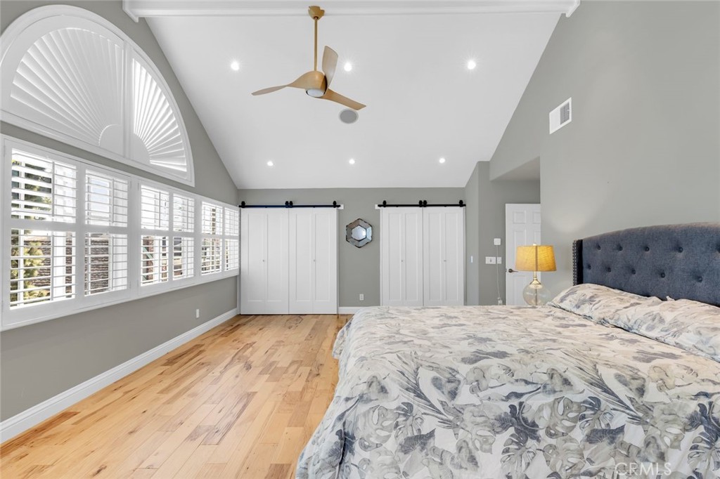 34061 Formosa Dana Point, CA 92629 - Photo 30 of 61 a spacious bedroom with a large bed and a large window