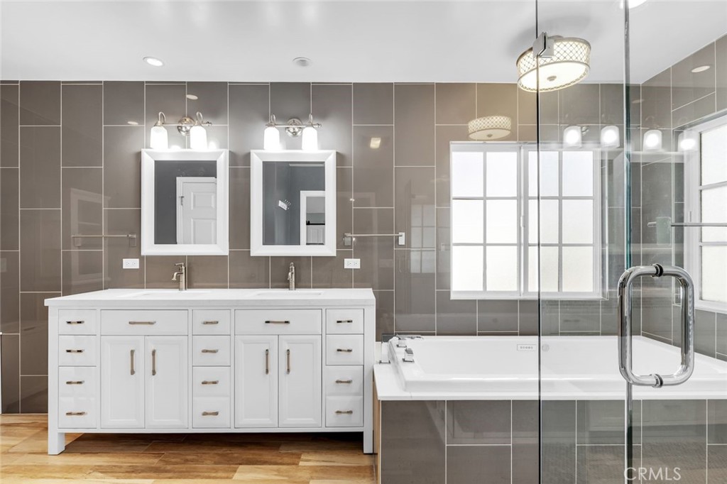 34061 Formosa Dana Point, CA 92629 - Photo 31 of 61 a bathroom with a double vanity sink and mirror