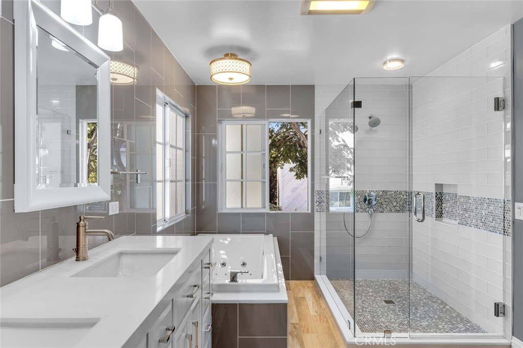 34061 Formosa Dana Point, CA 92629 - Photo 32 of 61 a bathroom with a tub sink and mirror