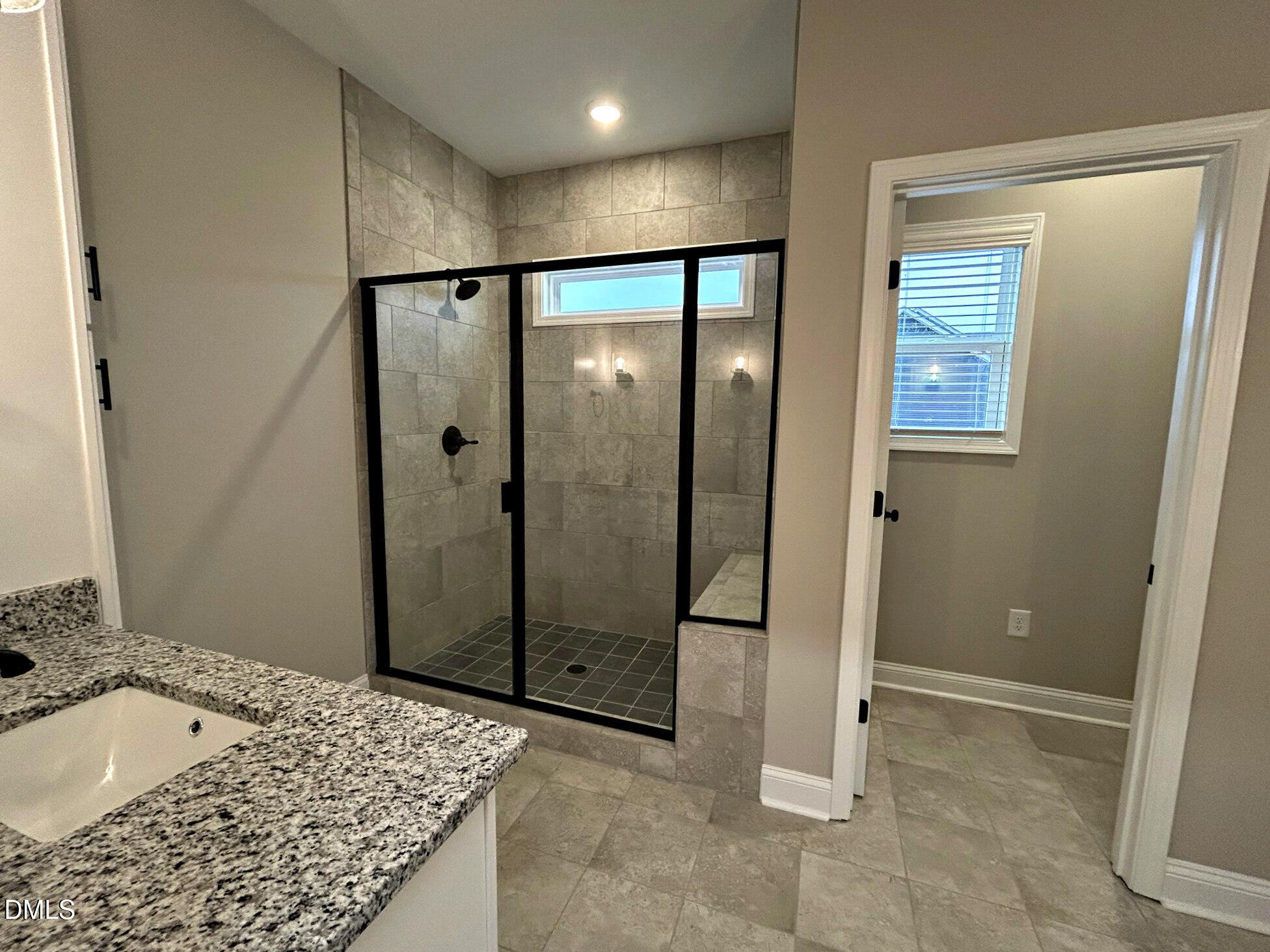113 Prency Lane Middlesex, NC 27557 - Photo 11 of 18 a bathroom with a granite countertop sink and shower