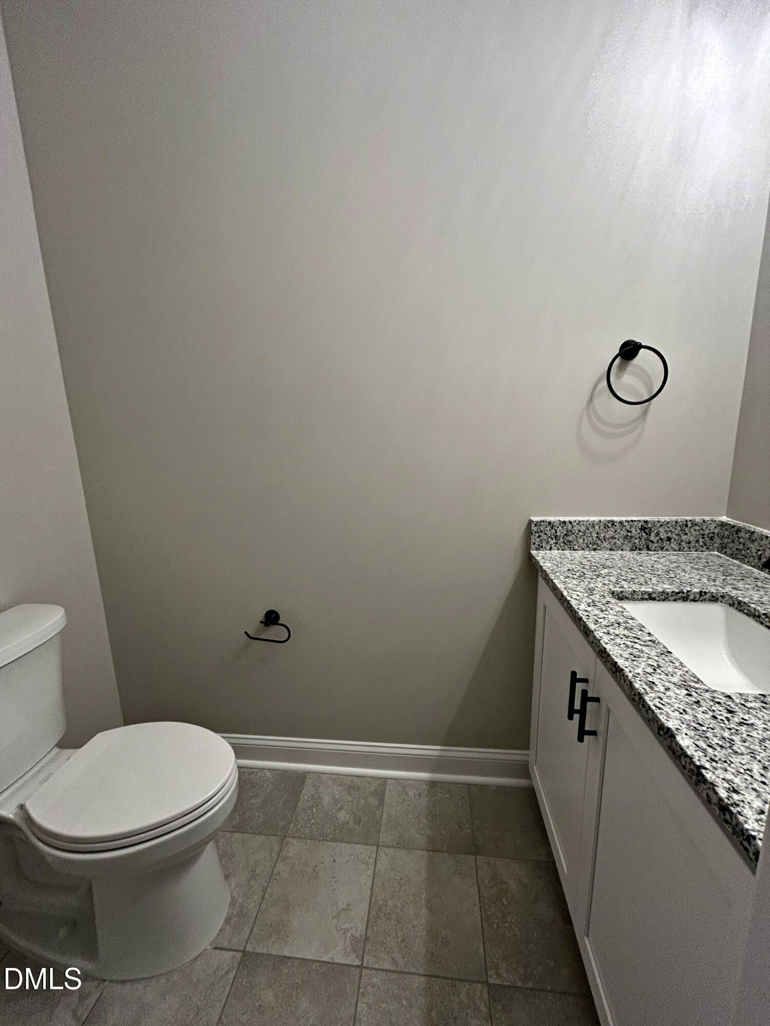 113 Prency Lane Middlesex, NC 27557 - Photo 13 of 18 a bathroom with a granite countertop toilet and a sink