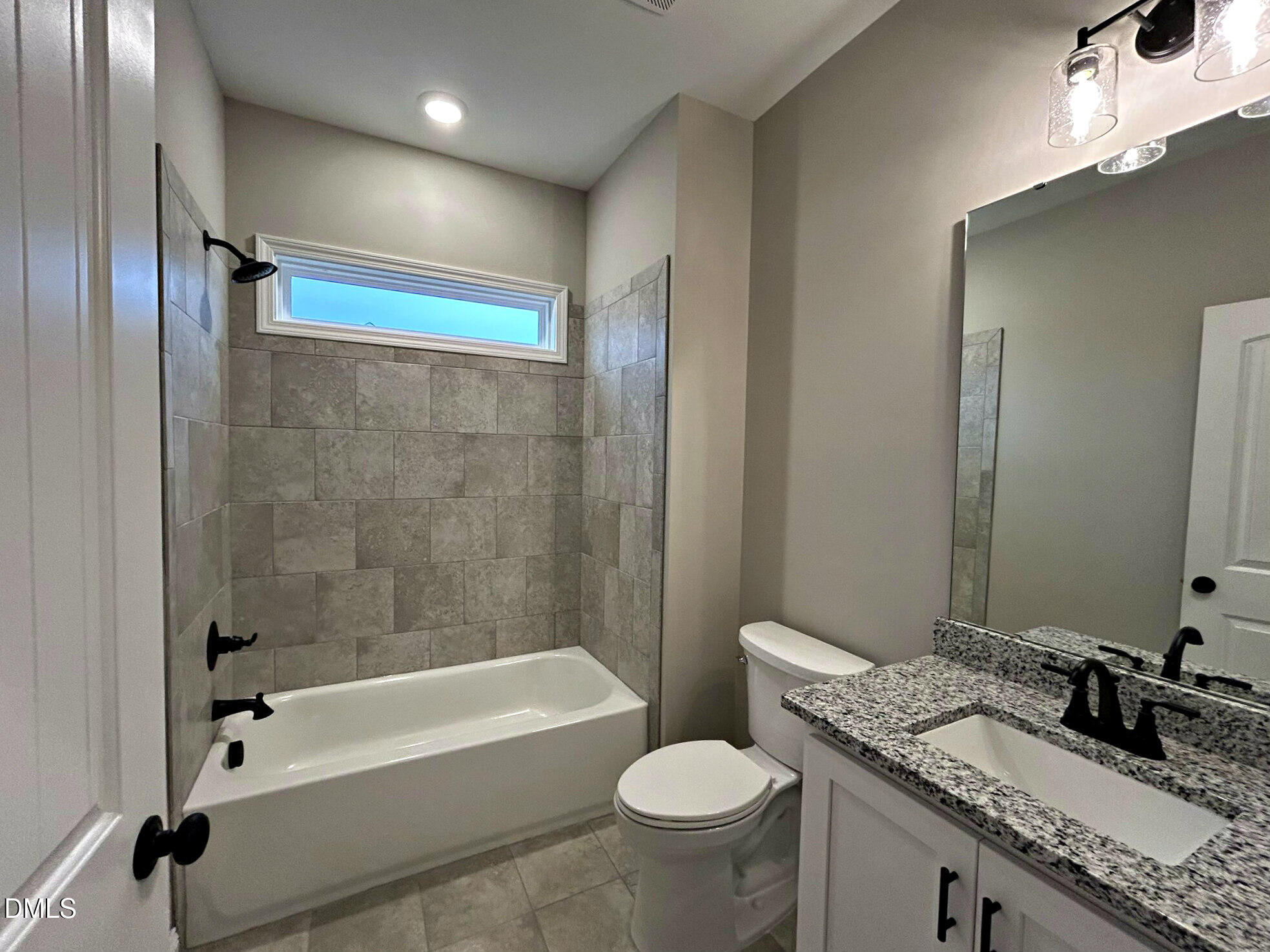 113 Prency Lane Middlesex, NC 27557 - Photo 16 of 18 a bathroom with a granite countertop sink toilet and shower
