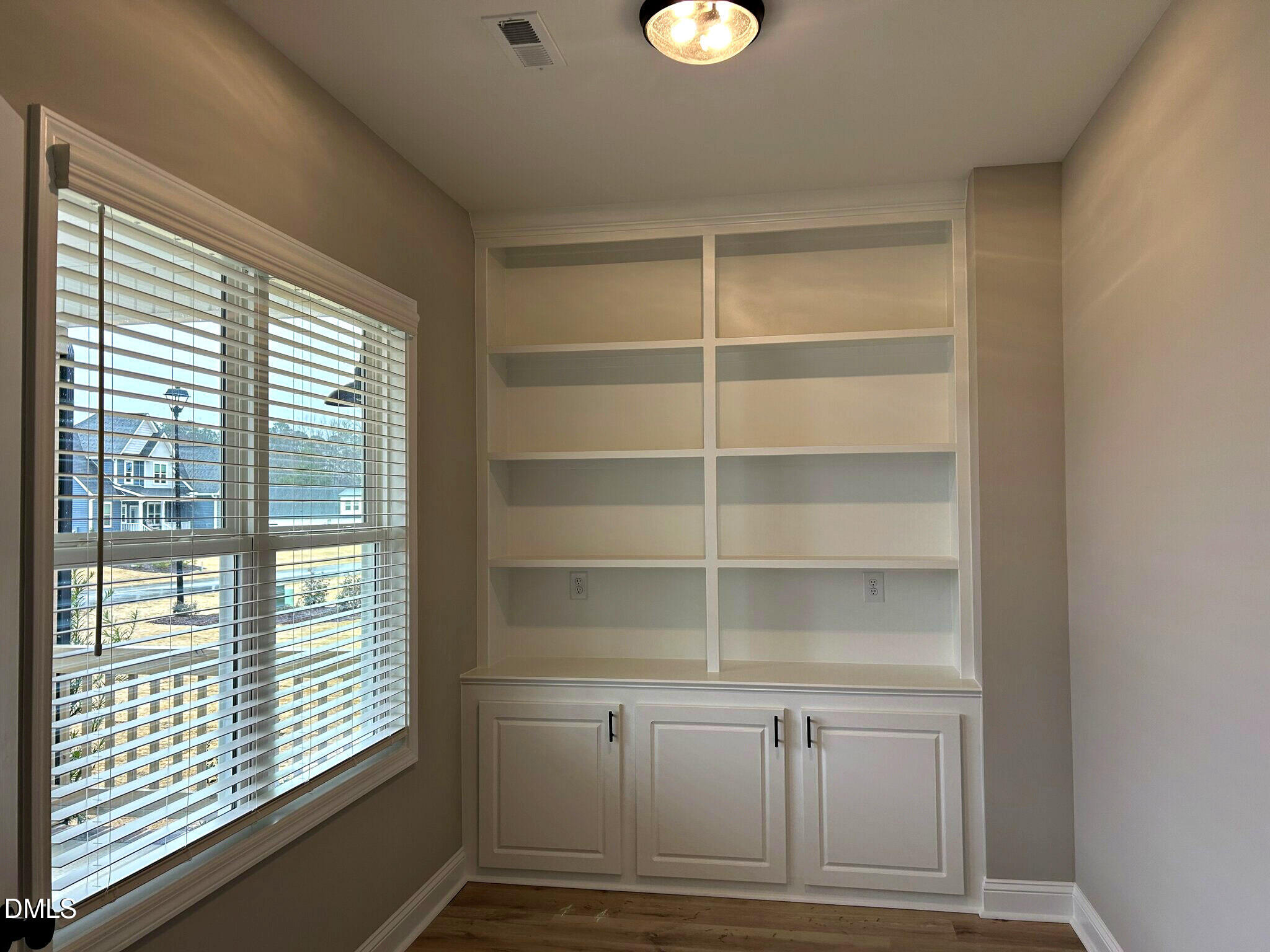 113 Prency Lane Middlesex, NC 27557 - Photo 4 of 18 a view of walk in closet with empty racks