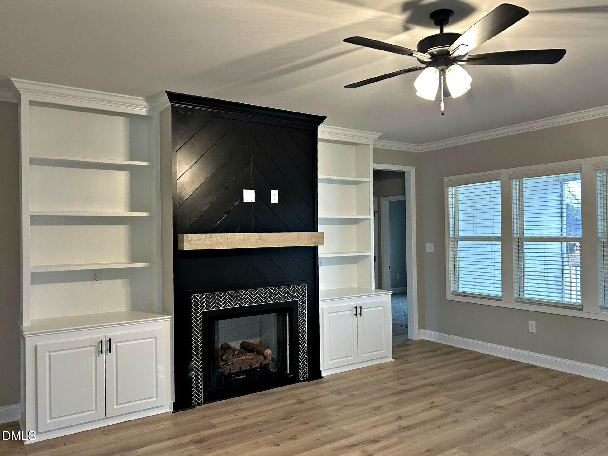 113 Prency Lane Middlesex, NC 27557 - Photo 5 of 18 a view of an empty room with a fireplace and a window
