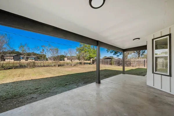 a view of a yard with an outdoor space