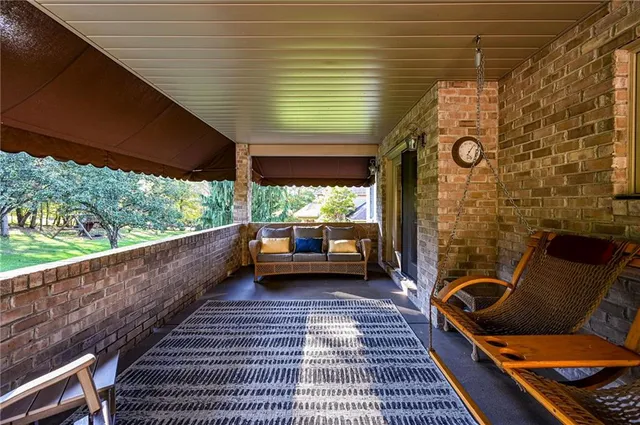 a balcony with furniture