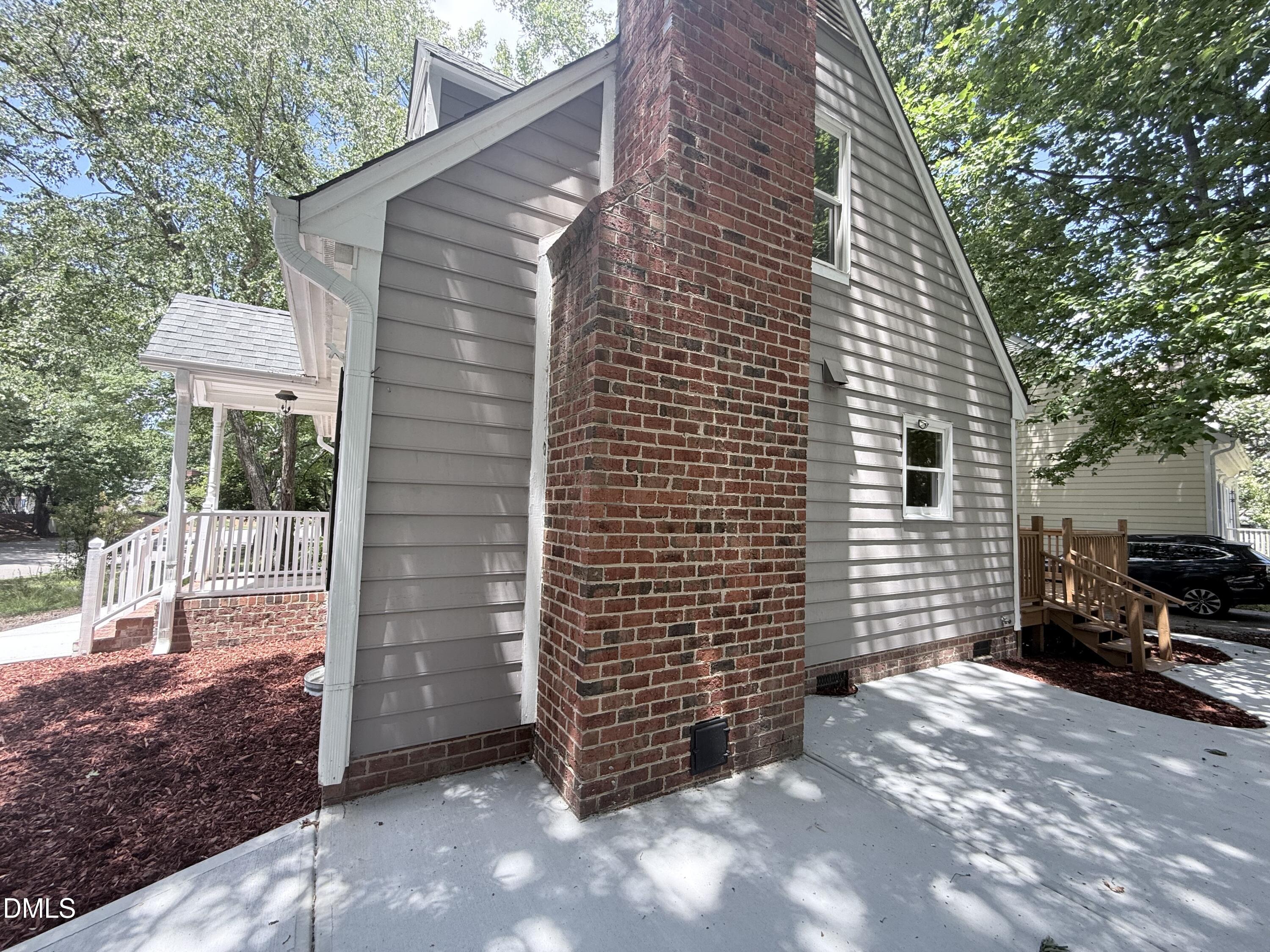2900 Broadlands Drive Raleigh, NC 27604 - Photo 17 of 60 a view of a house with a backyard