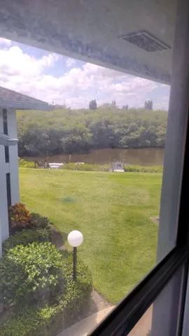 a view of a lake from a window