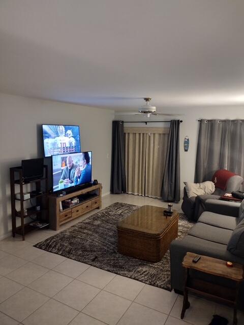 950 South Kanner Highway, Unit 508 Stuart, FL 34994 - Photo 7 of 15 a living room with furniture and a flat screen tv