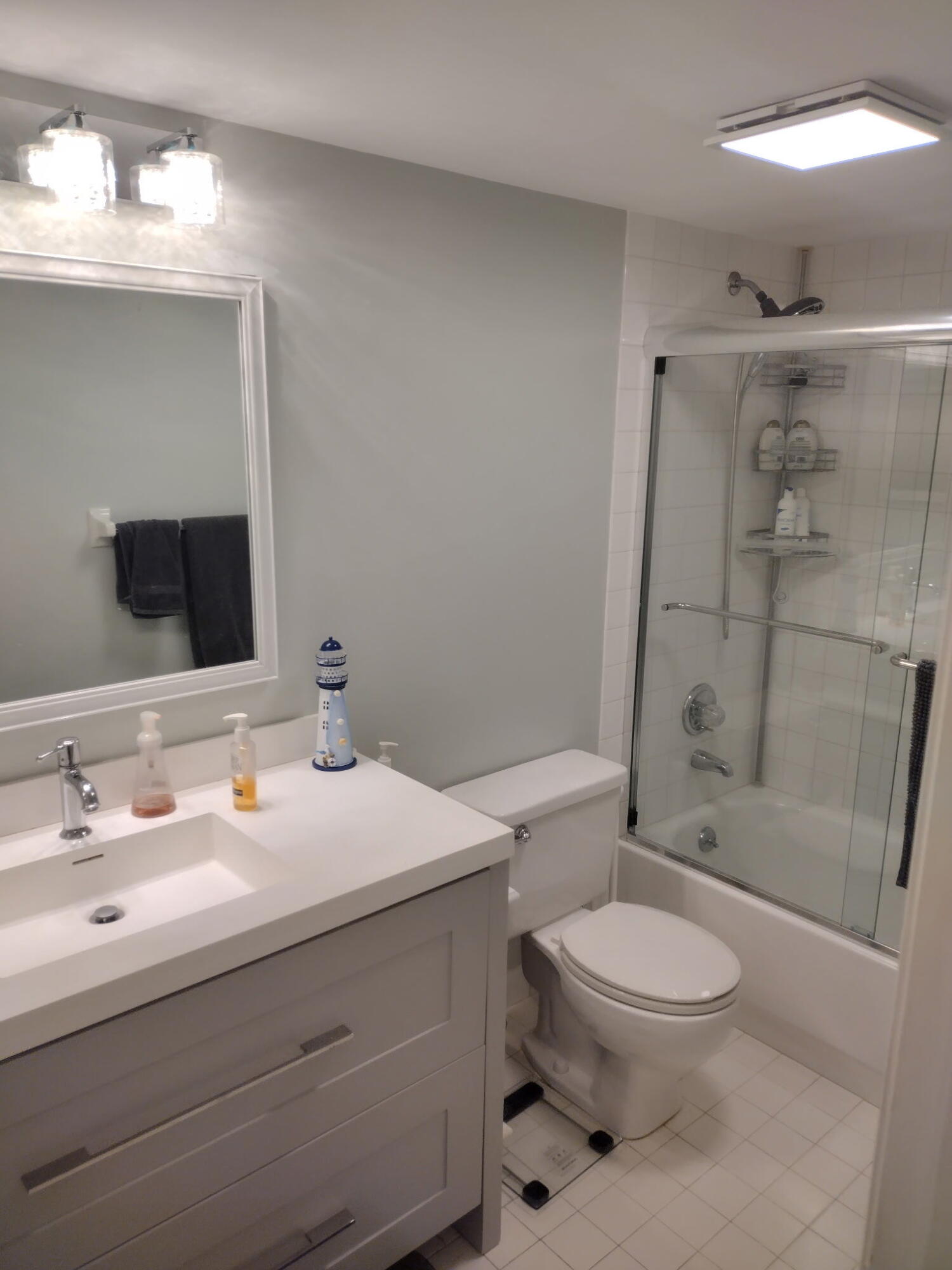 950 South Kanner Highway, Unit 508 Stuart, FL 34994 - Photo 9 of 15 a bathroom with a sink a toilet and shower