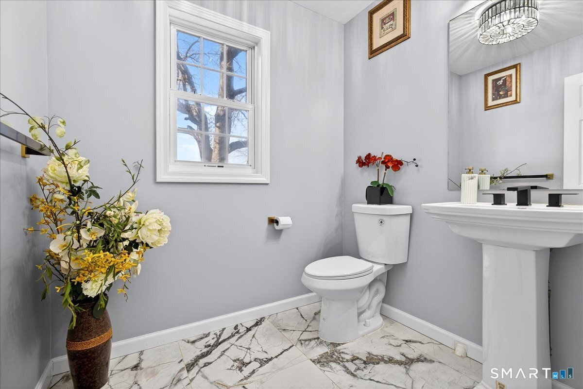 72 Broadmere Road Stratford, CT 06614 - Photo 13 of 34 Main floor half bathroom