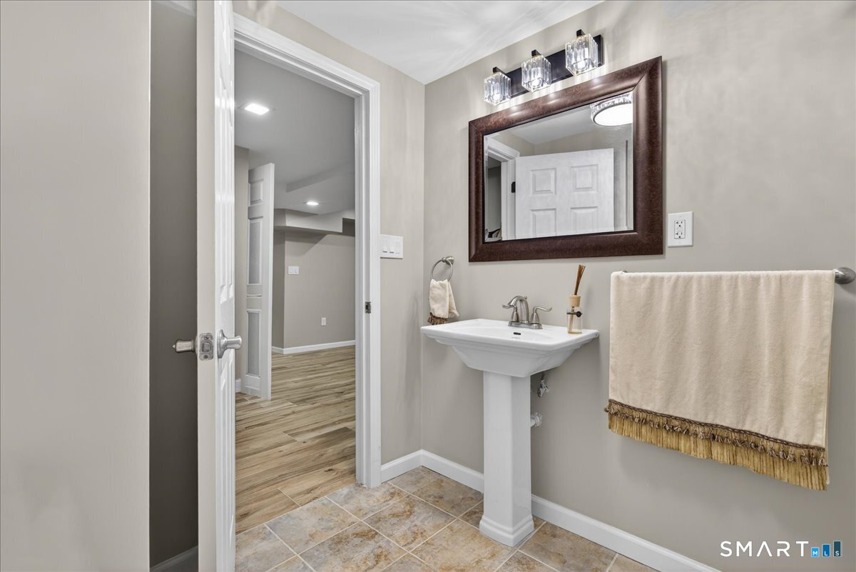 72 Broadmere Road Stratford, CT 06614 - Photo 27 of 34 Lower level half bathroom