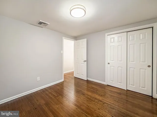 a bathroom with a sink and a window