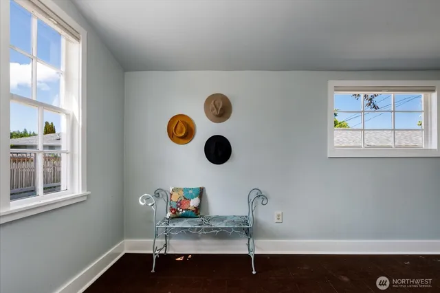 a living room with a table and a window