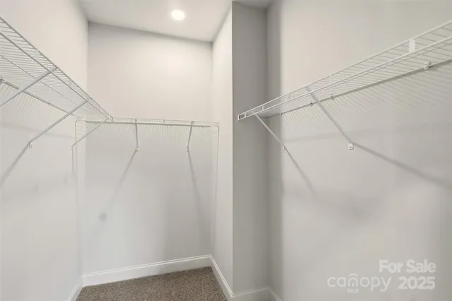 a view of a room with racks on the wall